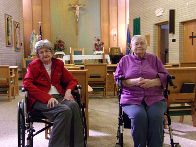 Barbara Schwan, left, and Hazel Anderson visit the chapel at Avera Mother Joseph Manor Retirement Community.
